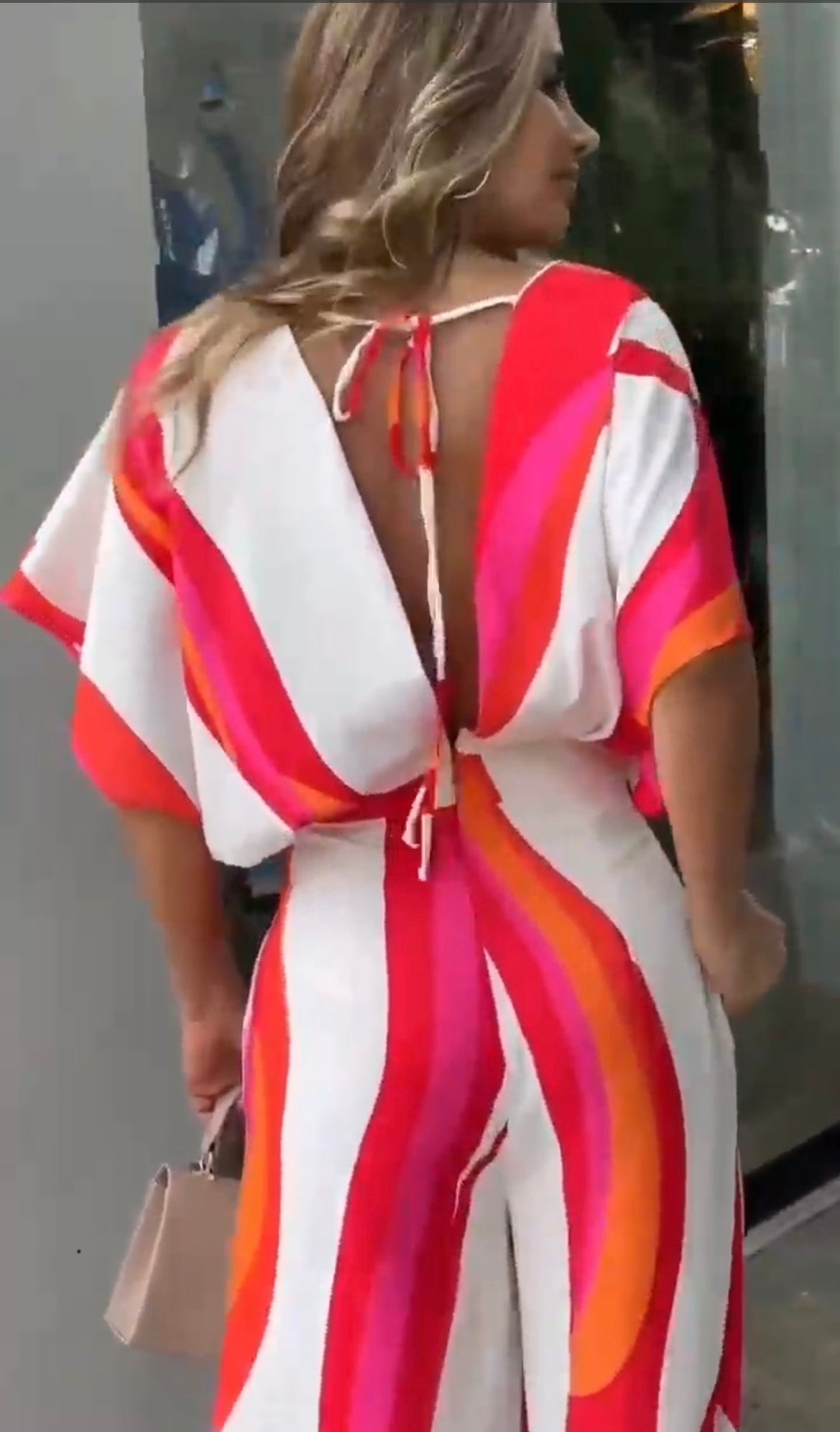 White, red, pink &amp; orange jumpsuit,  zip up back,  v neck front &amp; back,  tie string back,  wide leg,