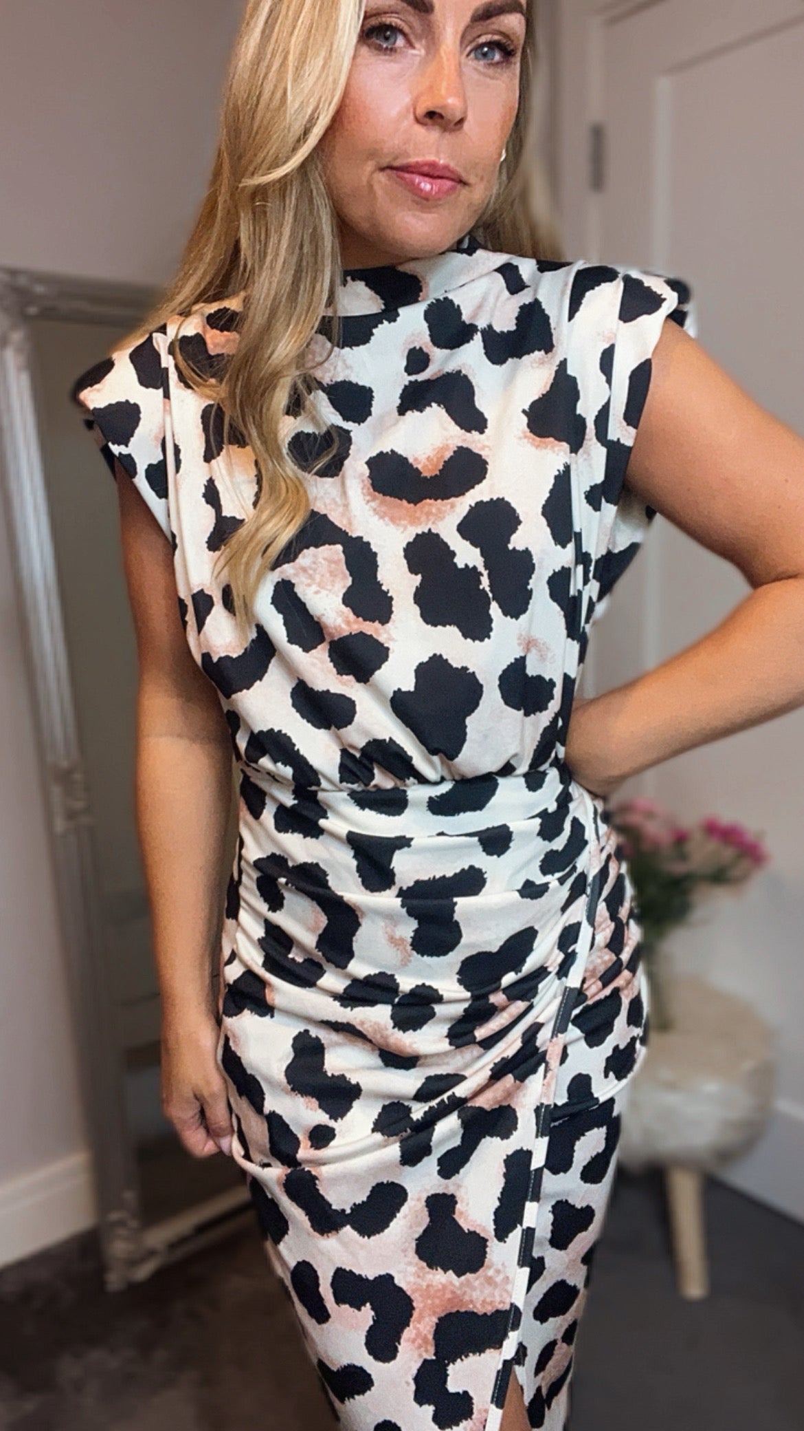 Leopard print dress,  front cross over split,  ruched detail to the side,  padded shoulders,  high neck.