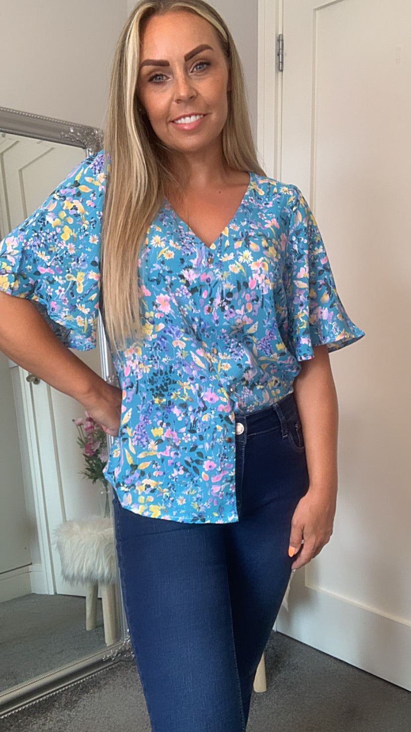 Women's Floral printed v neck top,  button detail, blue with yellow & pink flowers