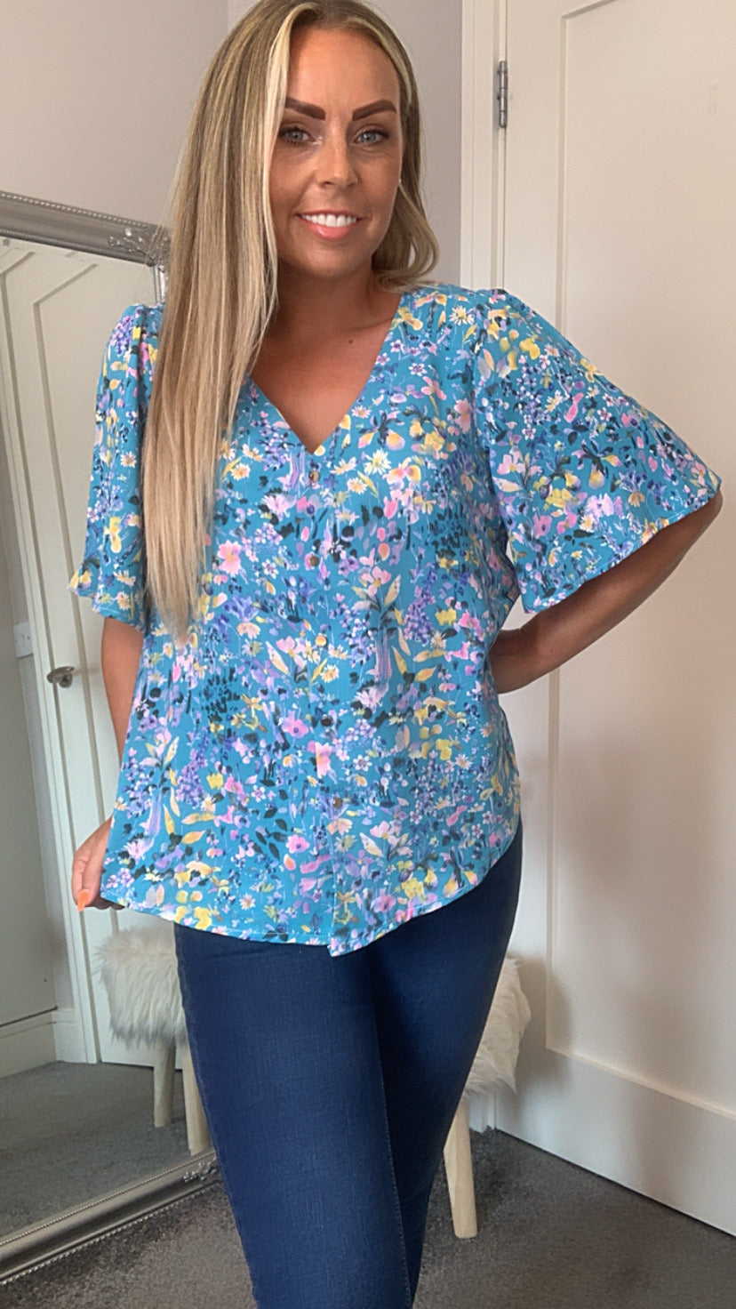 Women's Floral printed v neck top,  button detail, blue with yellow & pink flowers