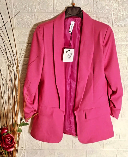 Pink women's blazer with ruched sleeve, collared neckline & faux pockets